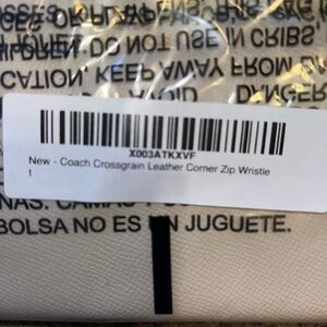 Coach Cream Leather Wristlet Clutch